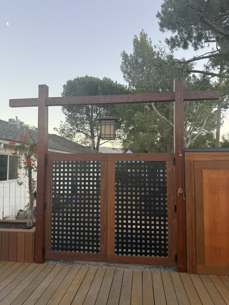 The Dojo interior design project in Newbury Park, CA: A leaning 1980s greenhouse reimagined as a 1,200 sq ft indoor-outdoor dojo - training floor, glass ceiling, and a torii gate, grown from a 1953 ranch.